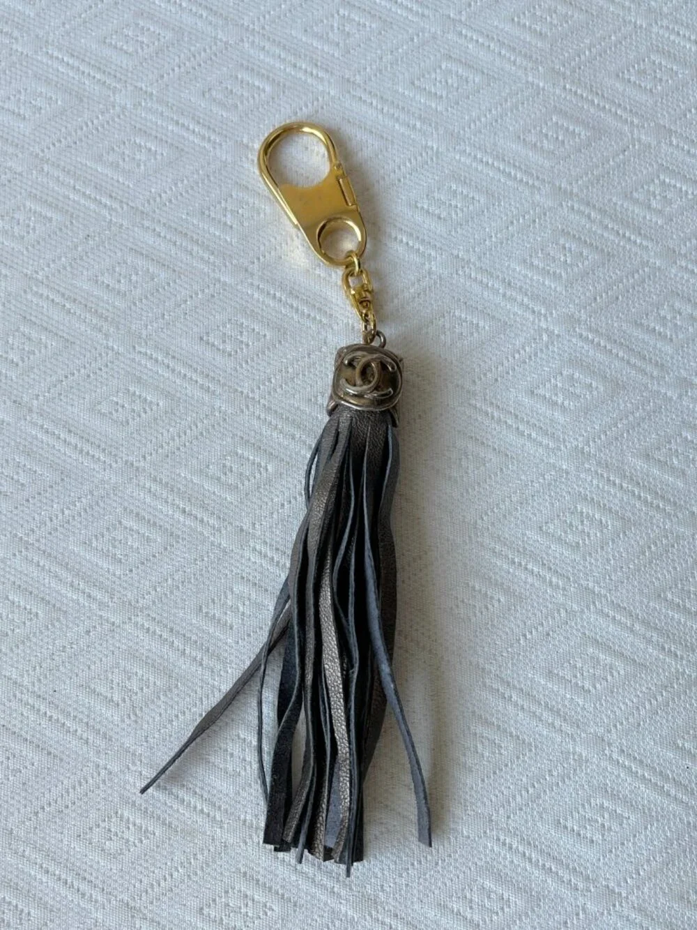 CC keychain gold with bronze leather fringe vintage